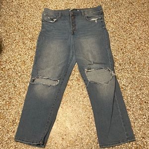 Plus size womens 18 jeans, very high rise, slight flare at the bottom.